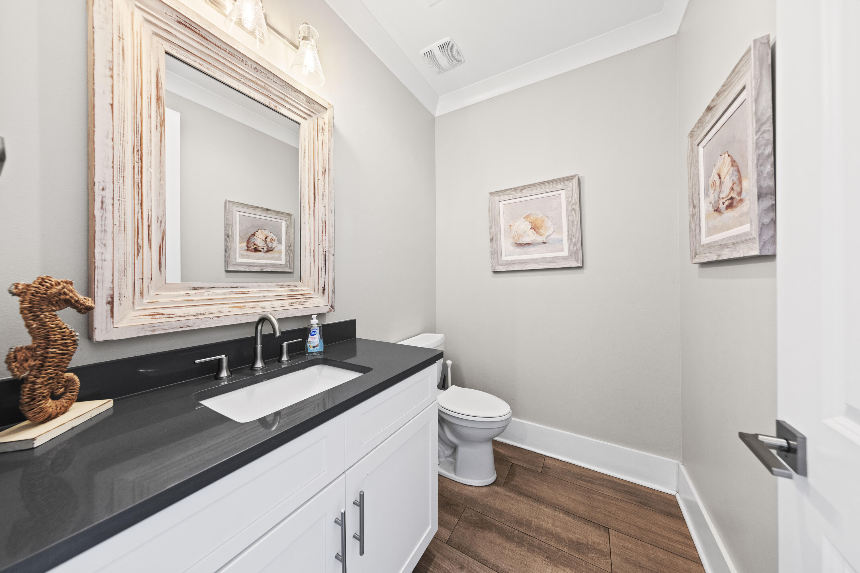 43 Calla Way Miramar Beach, FL 32550 - Photo 22 of 59 a bathroom with a sink and a mirror