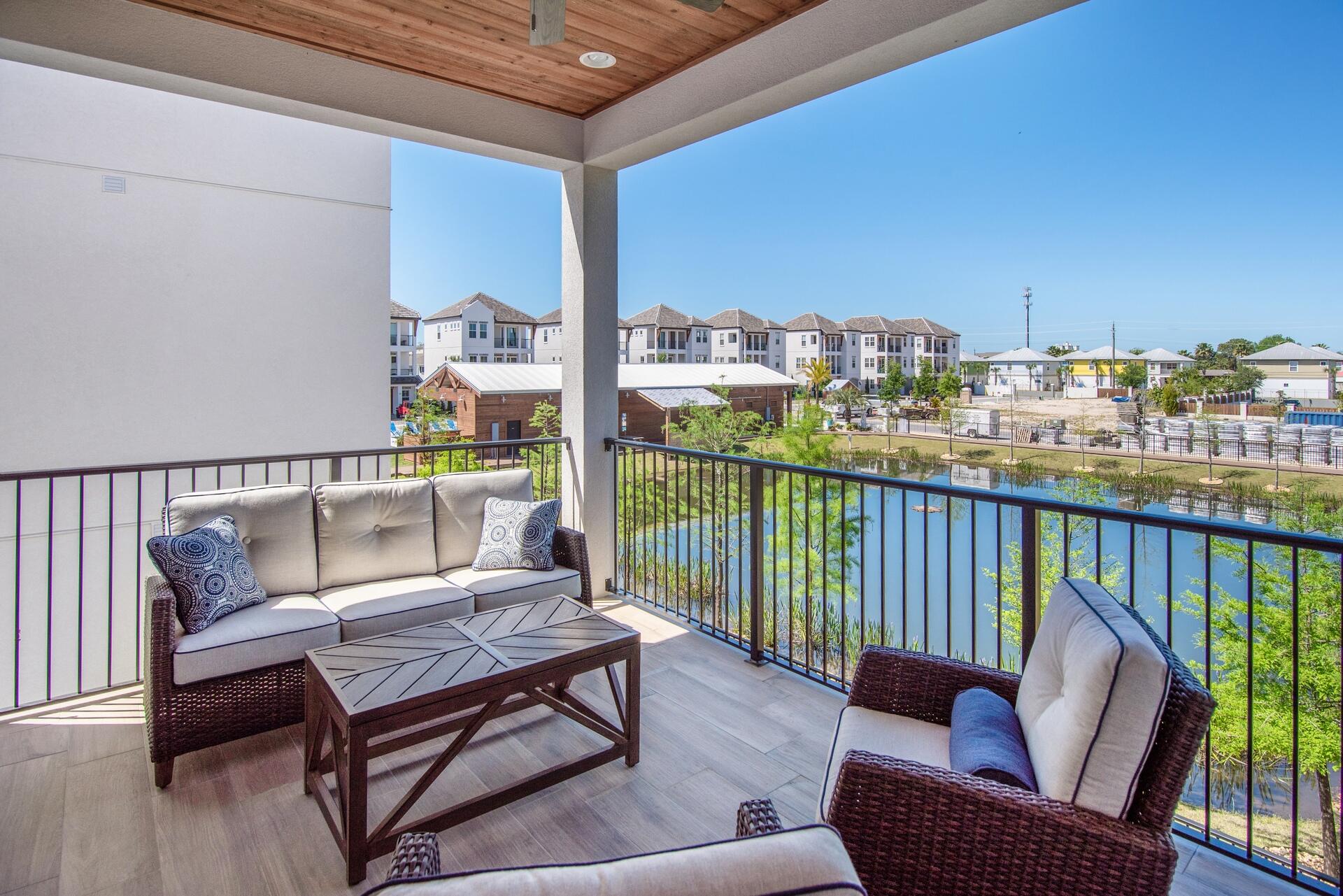 43 Calla Way Miramar Beach, FL 32550 - Photo 26 of 59 a balcony with wooden floor outdoor seating and city view