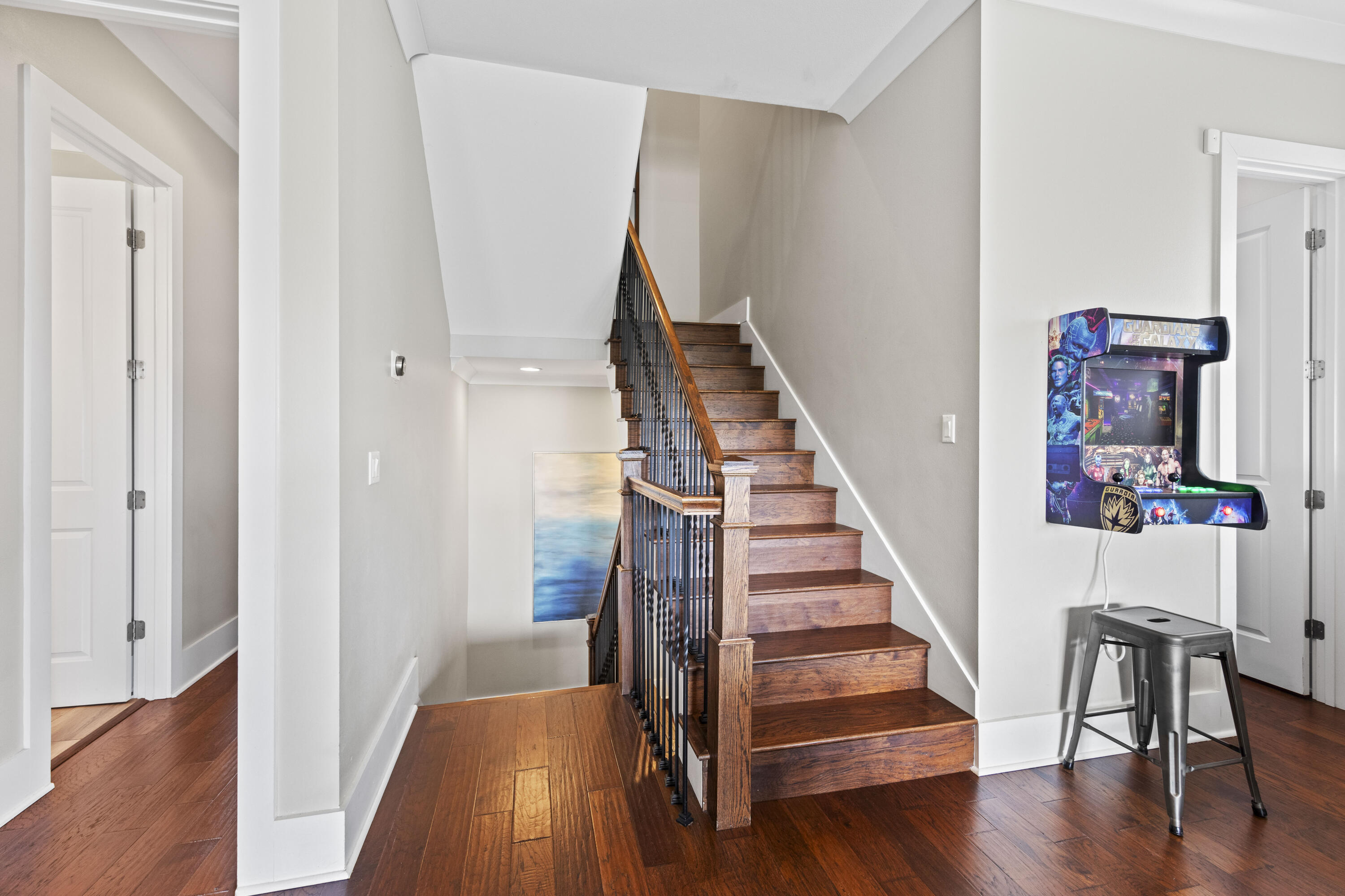 43 Calla Way Miramar Beach, FL 32550 - Photo 30 of 59 a view of a hallway with wooden floor and stairs