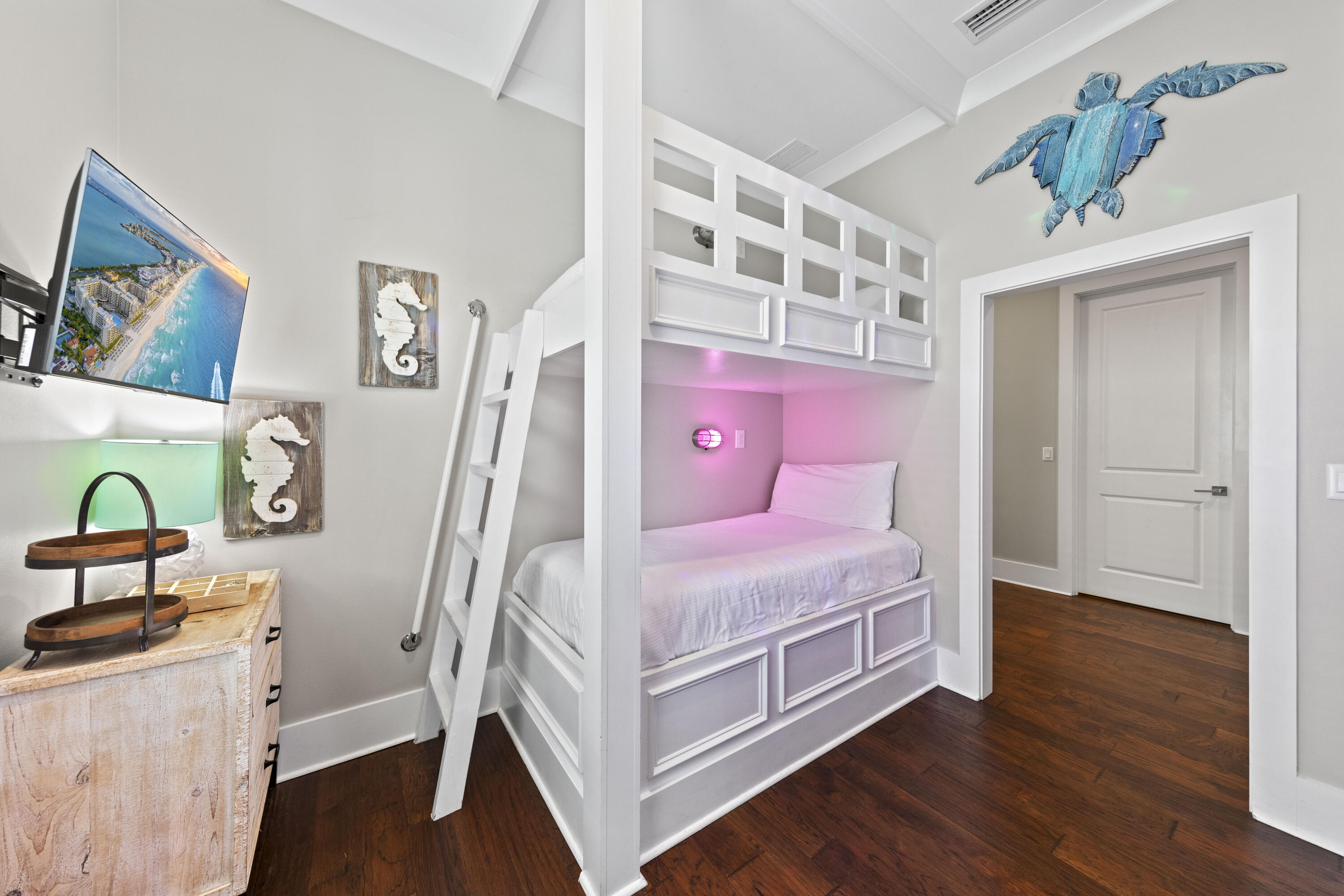 43 Calla Way Miramar Beach, FL 32550 - Photo 42 of 59 a bedroom with a bed and a flat tv screen on the dresser