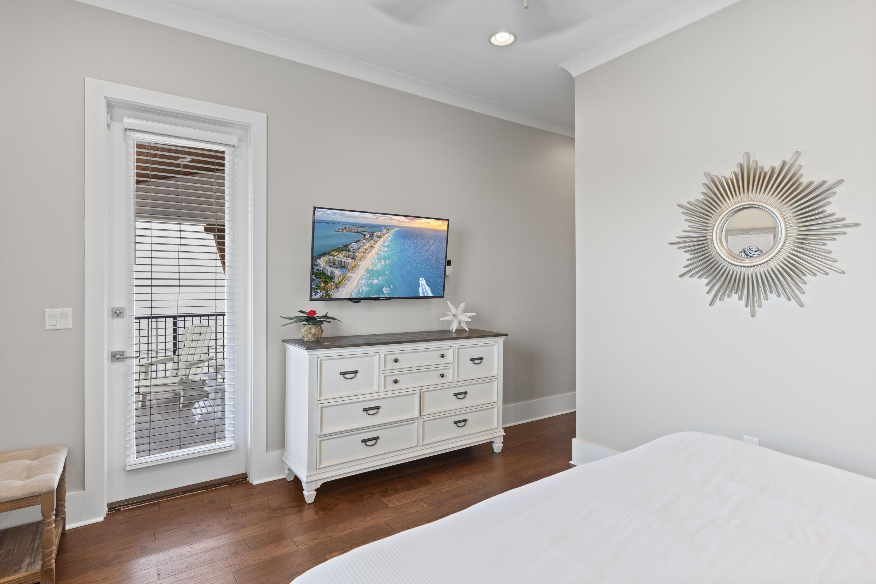 43 Calla Way Miramar Beach, FL 32550 - Photo 45 of 59 a bedroom with a bed and a chandelier