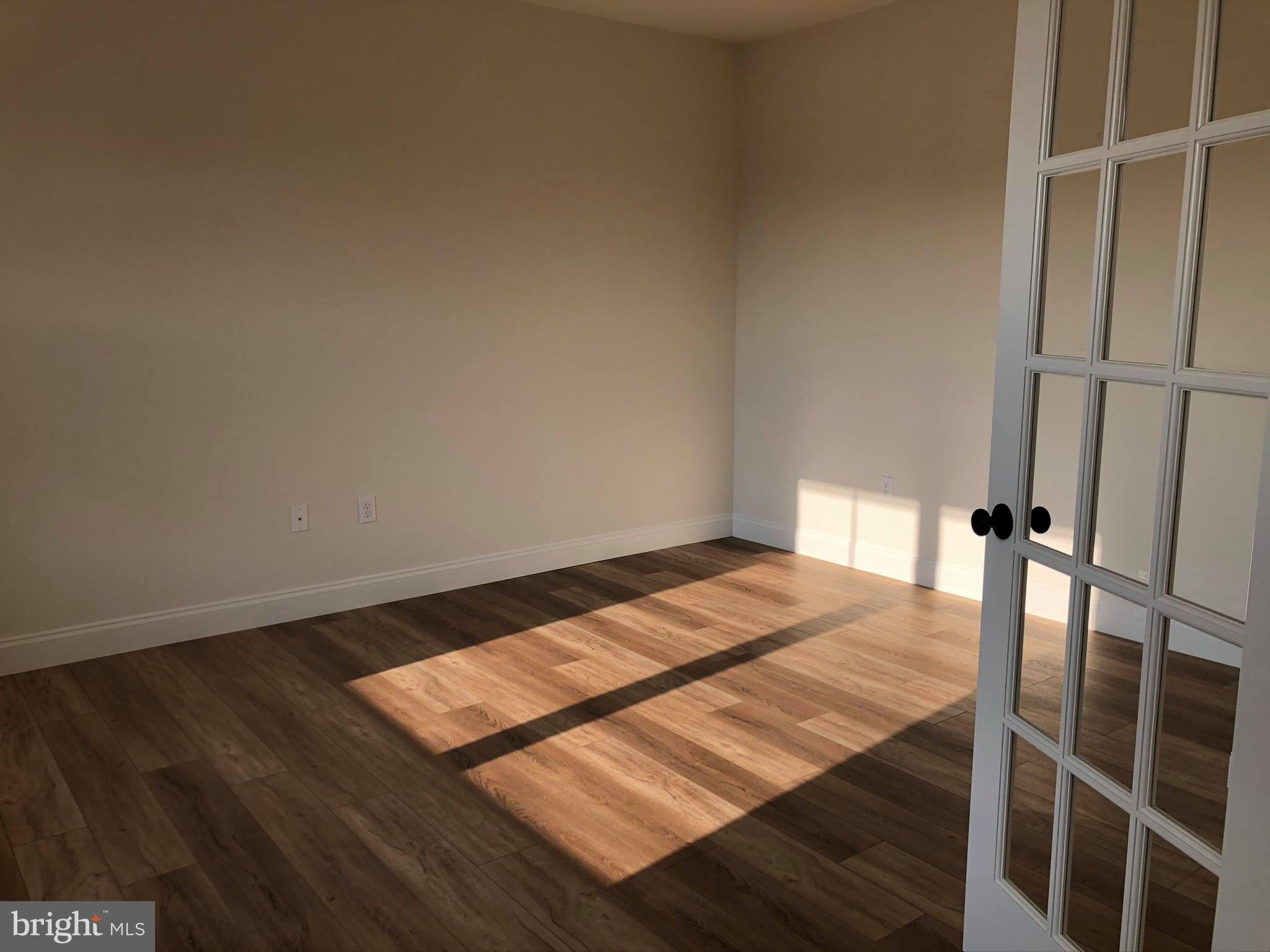2825 Egypt Road Audubon, PA 19403 - Photo 17 of 41 a bed sitting in a bedroom next to a window