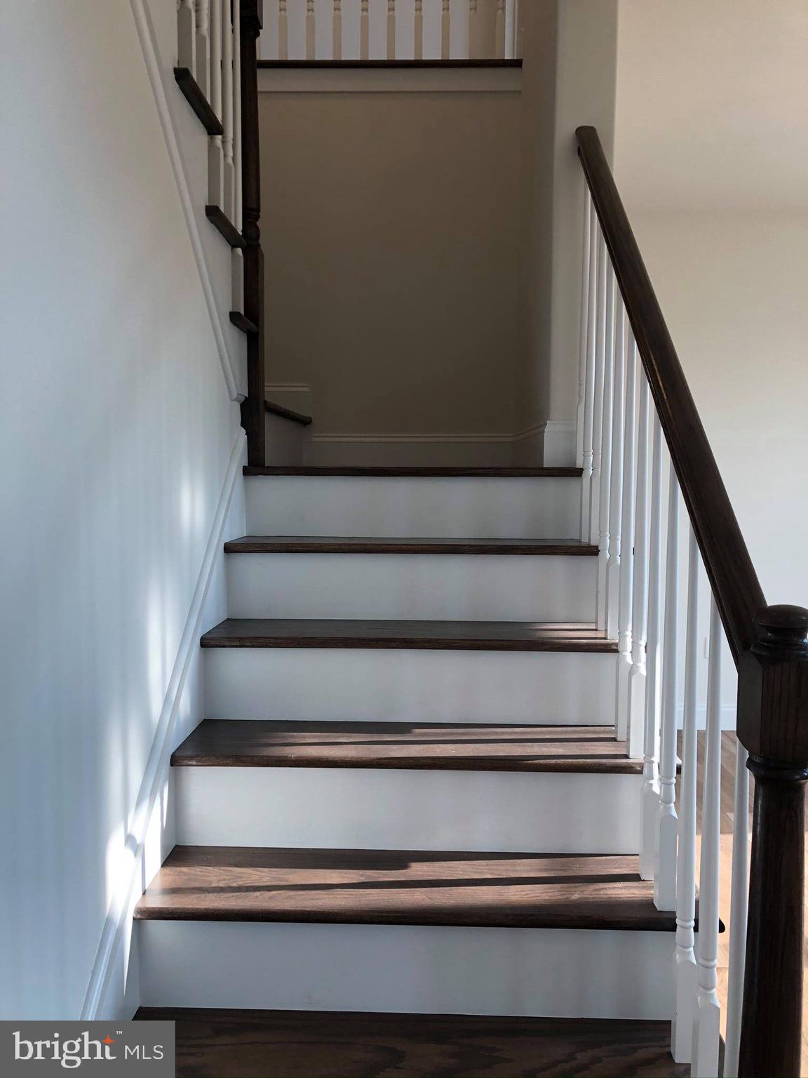 2825 Egypt Road Audubon, PA 19403 - Photo 21 of 41 a view of staircase with lots of frames on wall