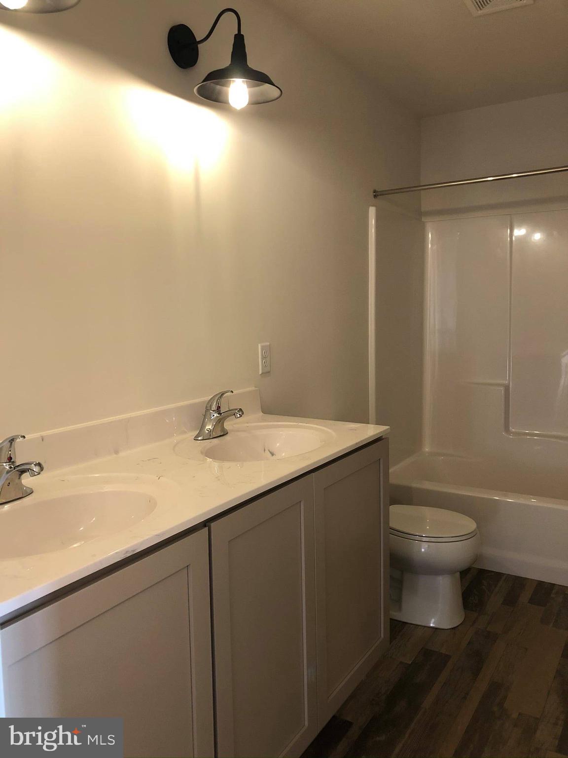 2825 Egypt Road Audubon, PA 19403 - Photo 36 of 41 a bathroom with a sink and a toilet