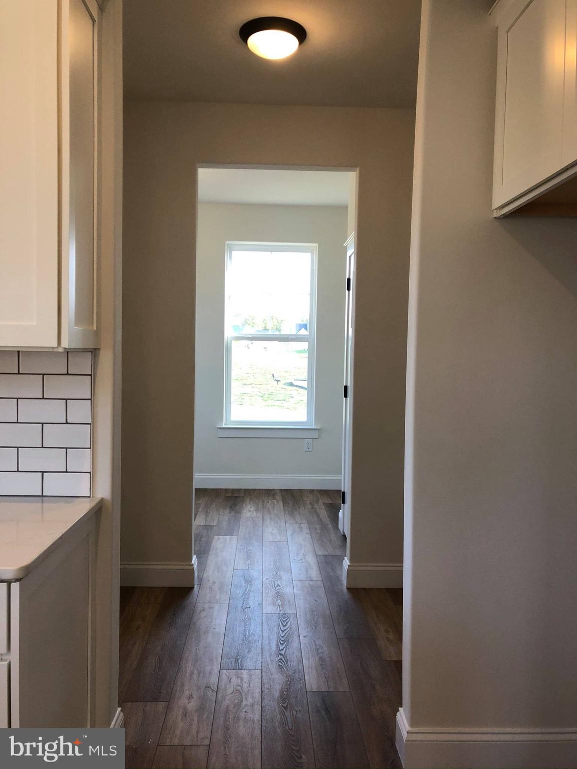2825 Egypt Road Audubon, PA 19403 - Photo 9 of 41 an empty room with wooden floor and windows