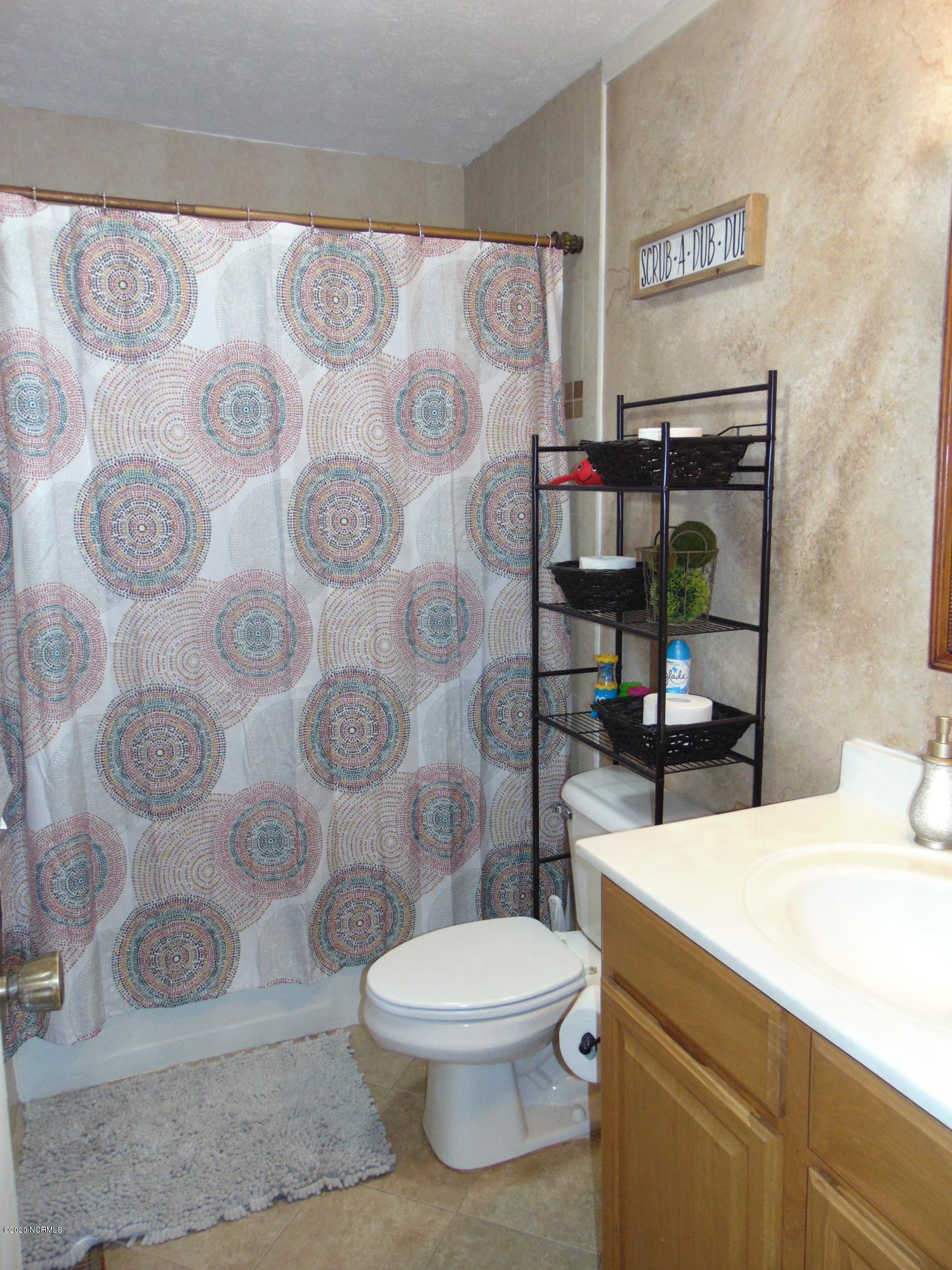 4111 Plantation Road Morehead City, NC 28557 - Photo 23 of 34 Second full bath