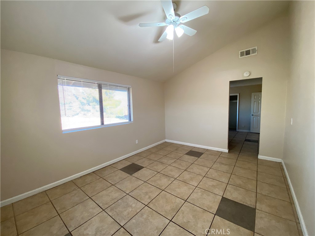 18746 Rock Springs Road Hesperia, CA 92345 - Photo 11 of 21 a view of an empty room and window