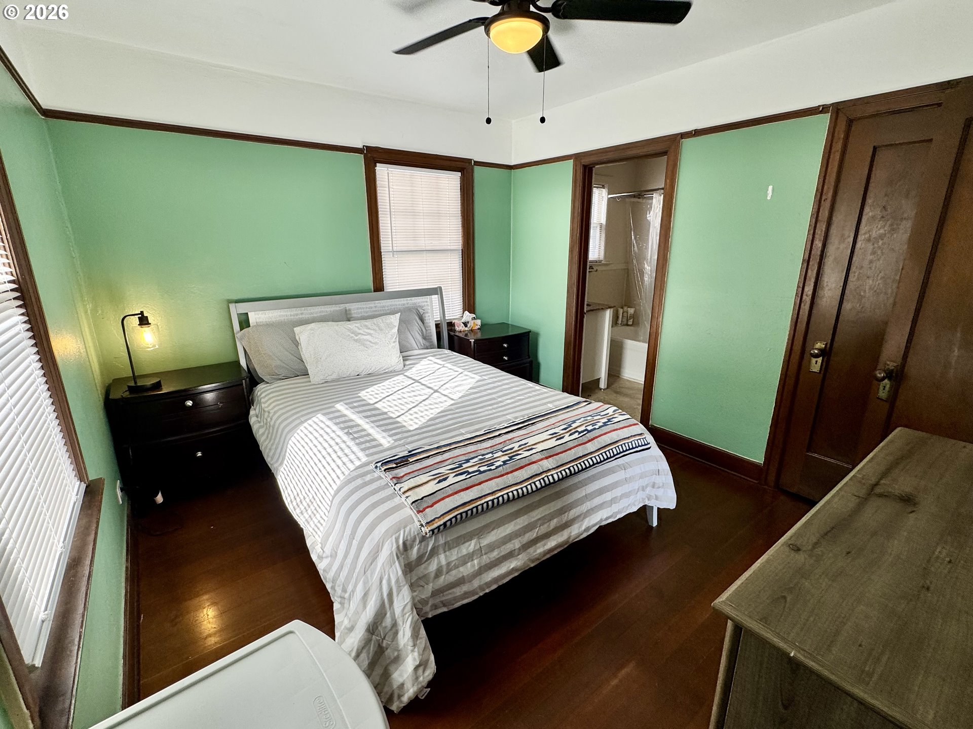 2243 3rd Street Baker City, OR 97814 - Photo 7 of 20 a bedroom with a bed dresser and a window