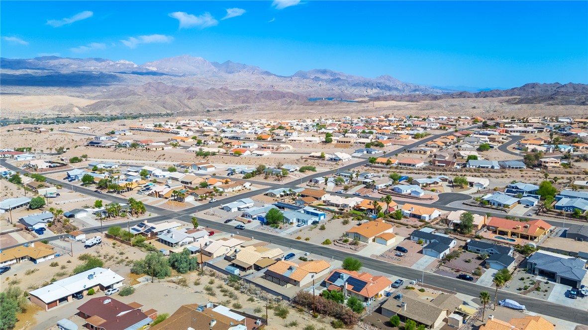 2524 South Ridge Avenue Bullhead City, AZ 86429 - Photo 56 of 64 Aerial overview of property's location with a mountain backdrop and nearby suburban area