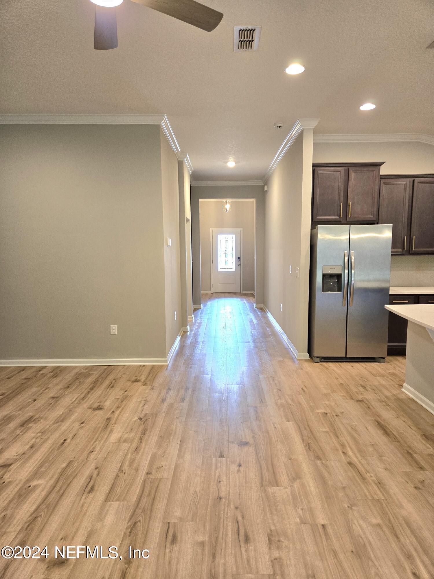7786 Island Fox Road Jacksonville, FL 32222 - Photo 13 of 37 Foyer to Door