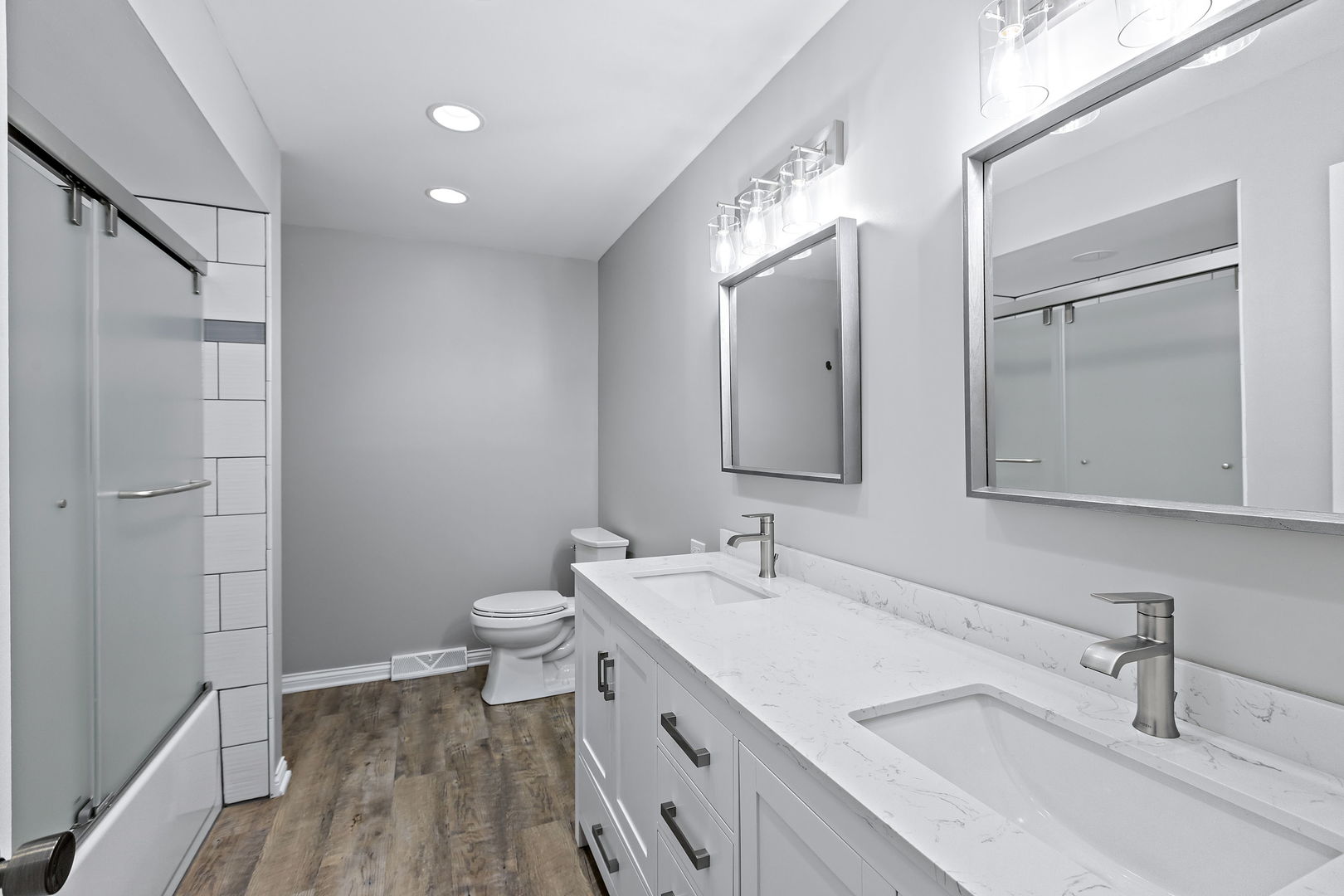 330 South Barrington Road Barrington, IL 60010 - Photo 15 of 39 a bathroom with a double vanity sink mirror and toilet