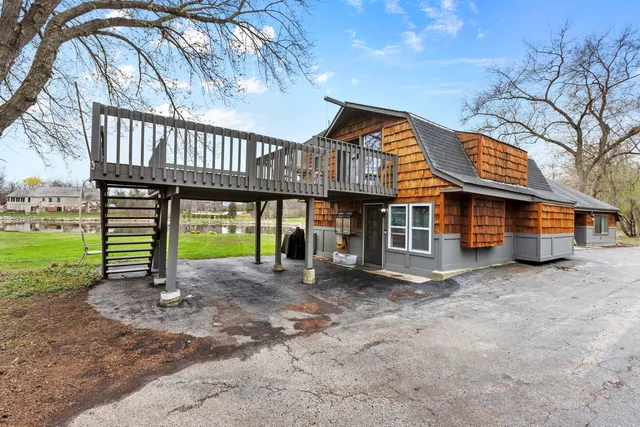a open kitchen with stainless steel appliances granite countertop a stove and cabinets