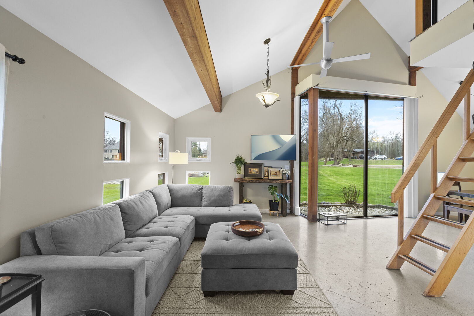 330 South Barrington Road Barrington, IL 60010 - Photo 32 of 39 a living room with furniture and a floor to ceiling window