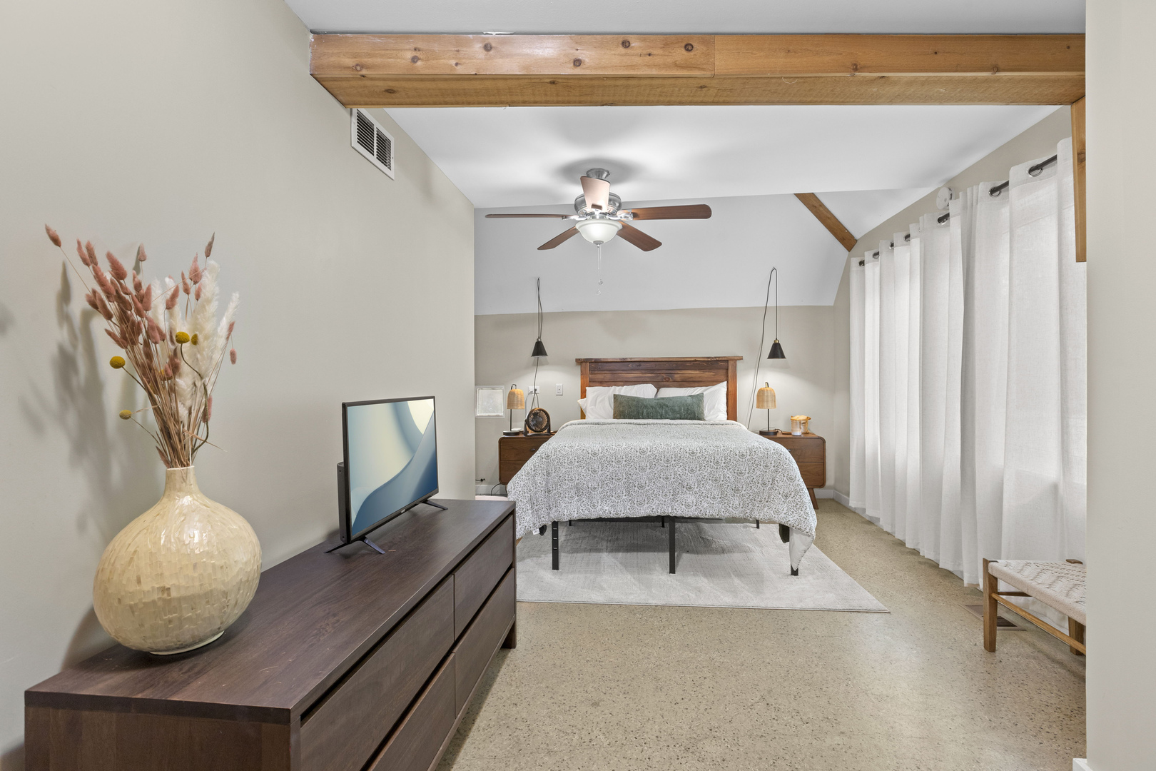 330 South Barrington Road Barrington, IL 60010 - Photo 36 of 39 a bedroom with a large bed and a chandelier