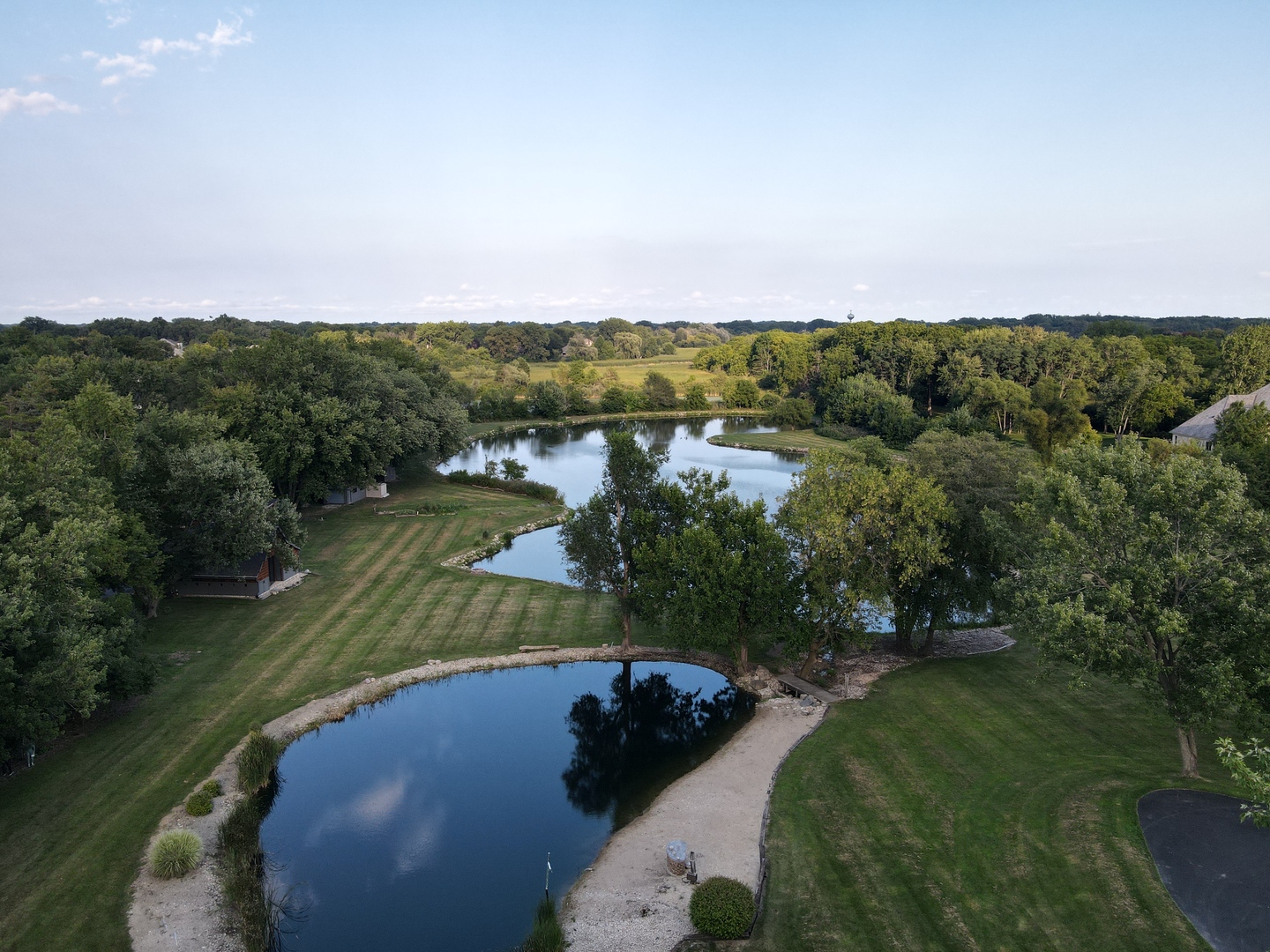 330 South Barrington Road Barrington, IL 60010 - Photo 5 of 39 a view of a lake in middle of forest