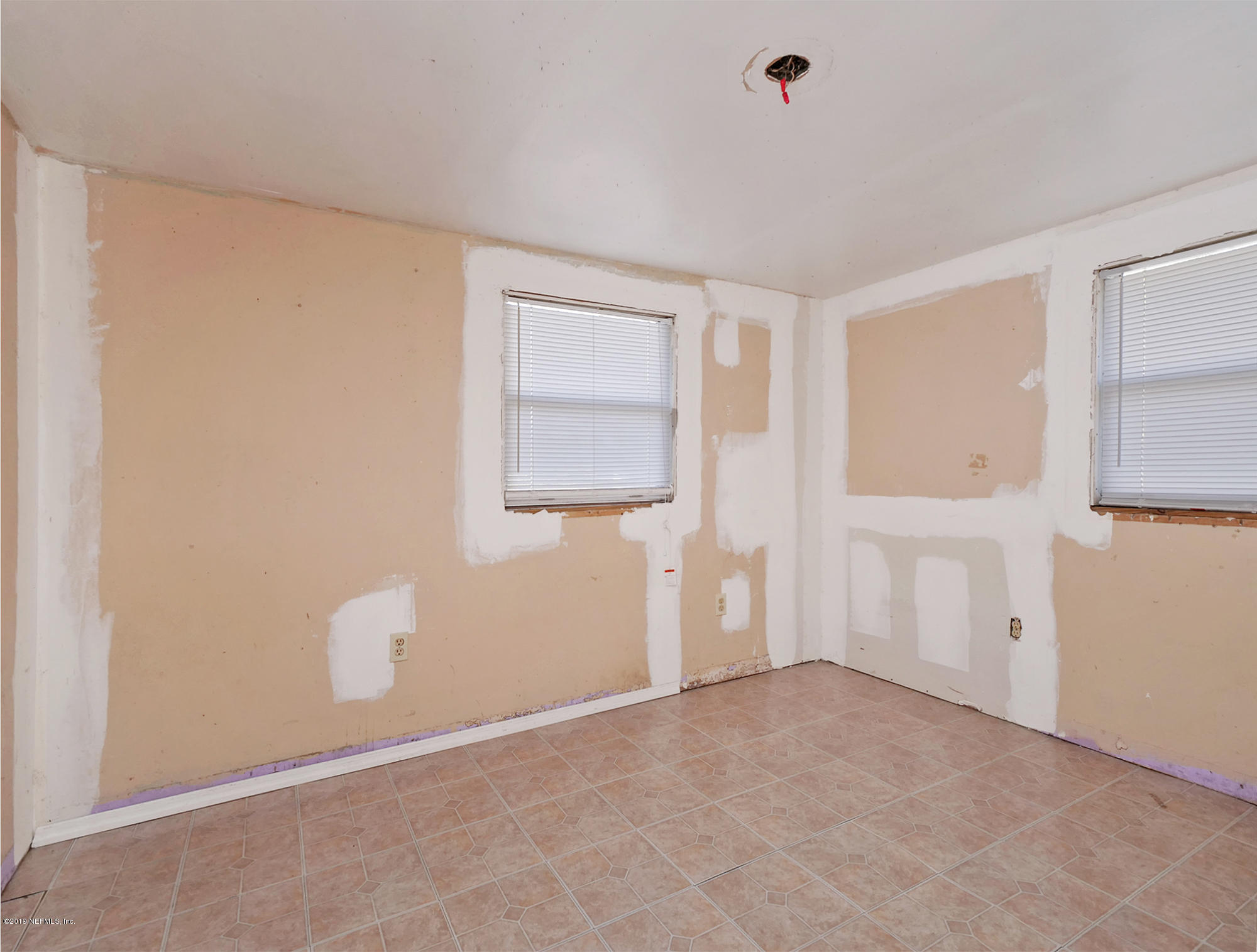 13143 Pate Road West Jacksonville, FL 32226 - Photo 16 of 23 an empty room with windows