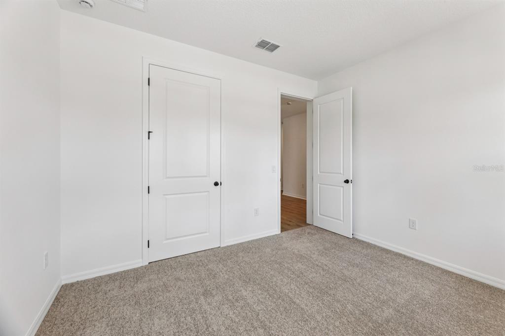 5721 Haystack Drive St. Cloud, FL 34771 - Photo 17 of 36 a view of an empty room