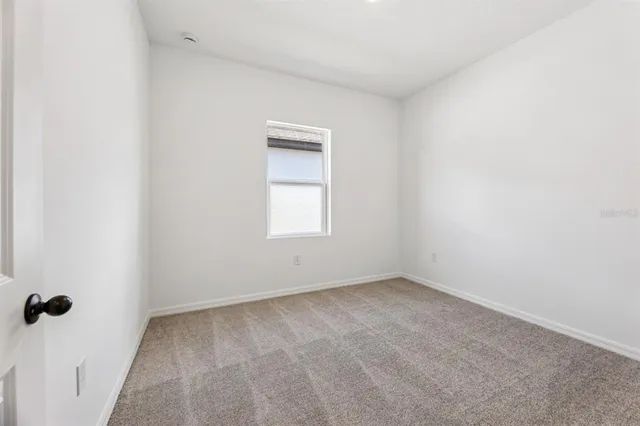 an empty room with a window