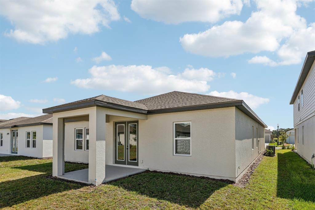 5721 Haystack Drive St. Cloud, FL 34771 - Photo 35 of 36 a front view of a house with a yard