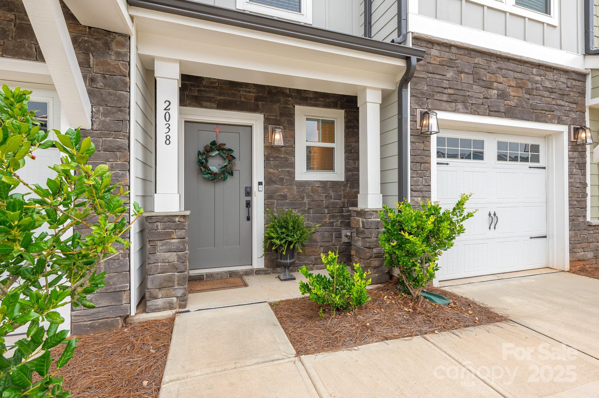 2038 Crooked Oak Lane, Unit 16 York, SC 29745 - Photo 1 of 24 a front view of a house with a yard