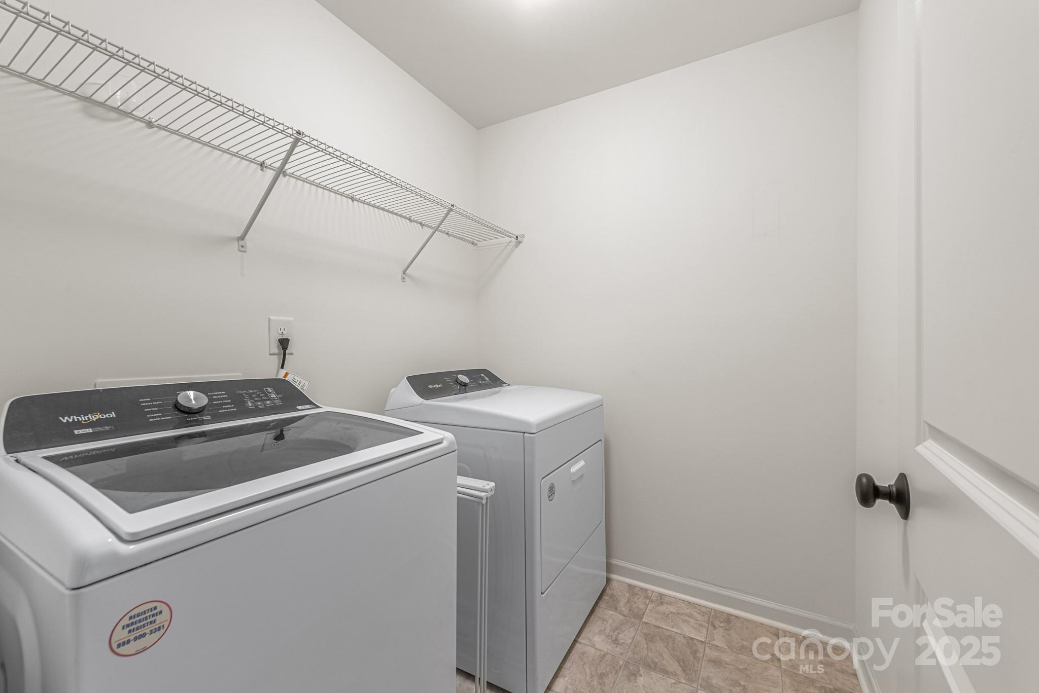 2038 Crooked Oak Lane, Unit 16 York, SC 29745 - Photo 17 of 24 a utility room with dryer and washer