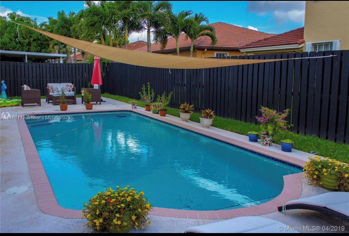 The Hammocks Miami, FL 33196 - Photo 8 of 9 a view of swimming pool outdoor seating