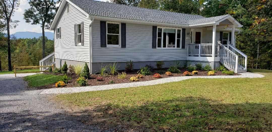 129 Bethel Ridge Road Catskill, NY 12414 - Photo 1 of 35 a view of a house with backyard and sitting area