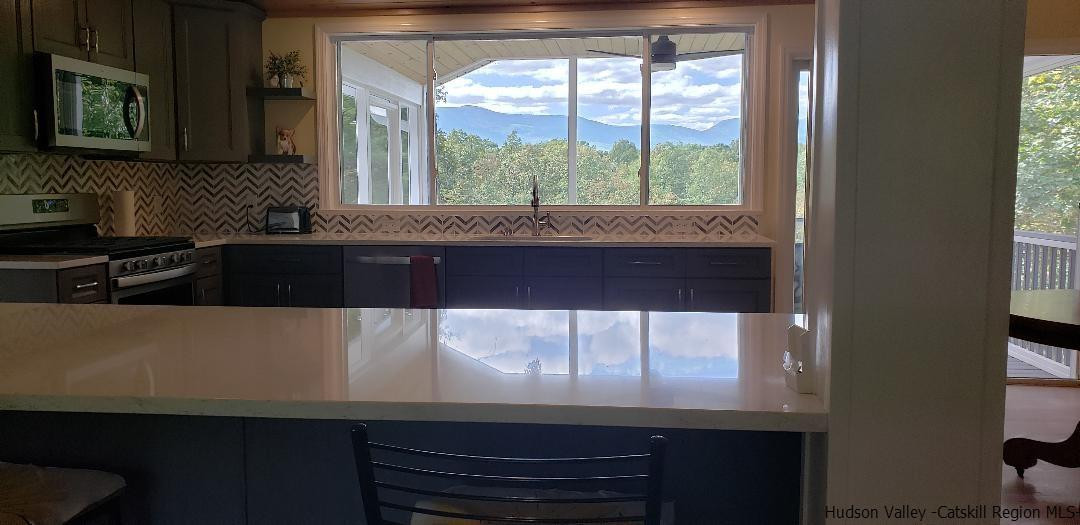129 Bethel Ridge Road Catskill, NY 12414 - Photo 12 of 35 a kitchen with a large window