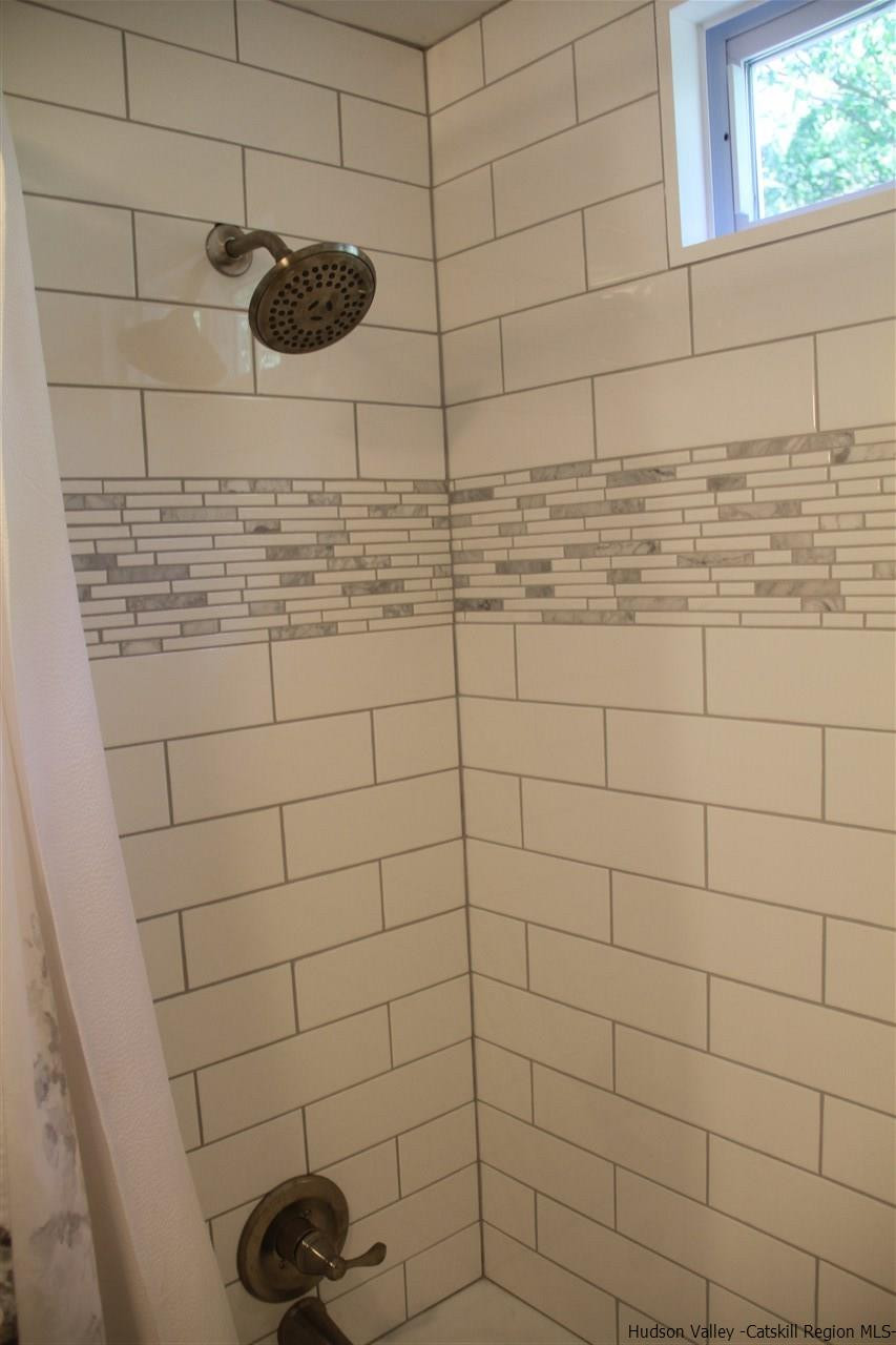 129 Bethel Ridge Road Catskill, NY 12414 - Photo 21 of 35 a bathroom with a shower