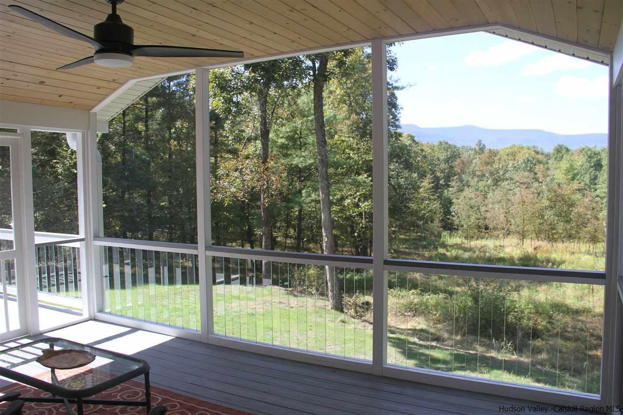 129 Bethel Ridge Road Catskill, NY 12414 - Photo 23 of 35 a view of a two chair in the balcony