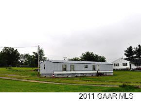 1540 Ridge Road Raphine, VA 24472 - Photo 2 of 3 a front view of a house with a garden