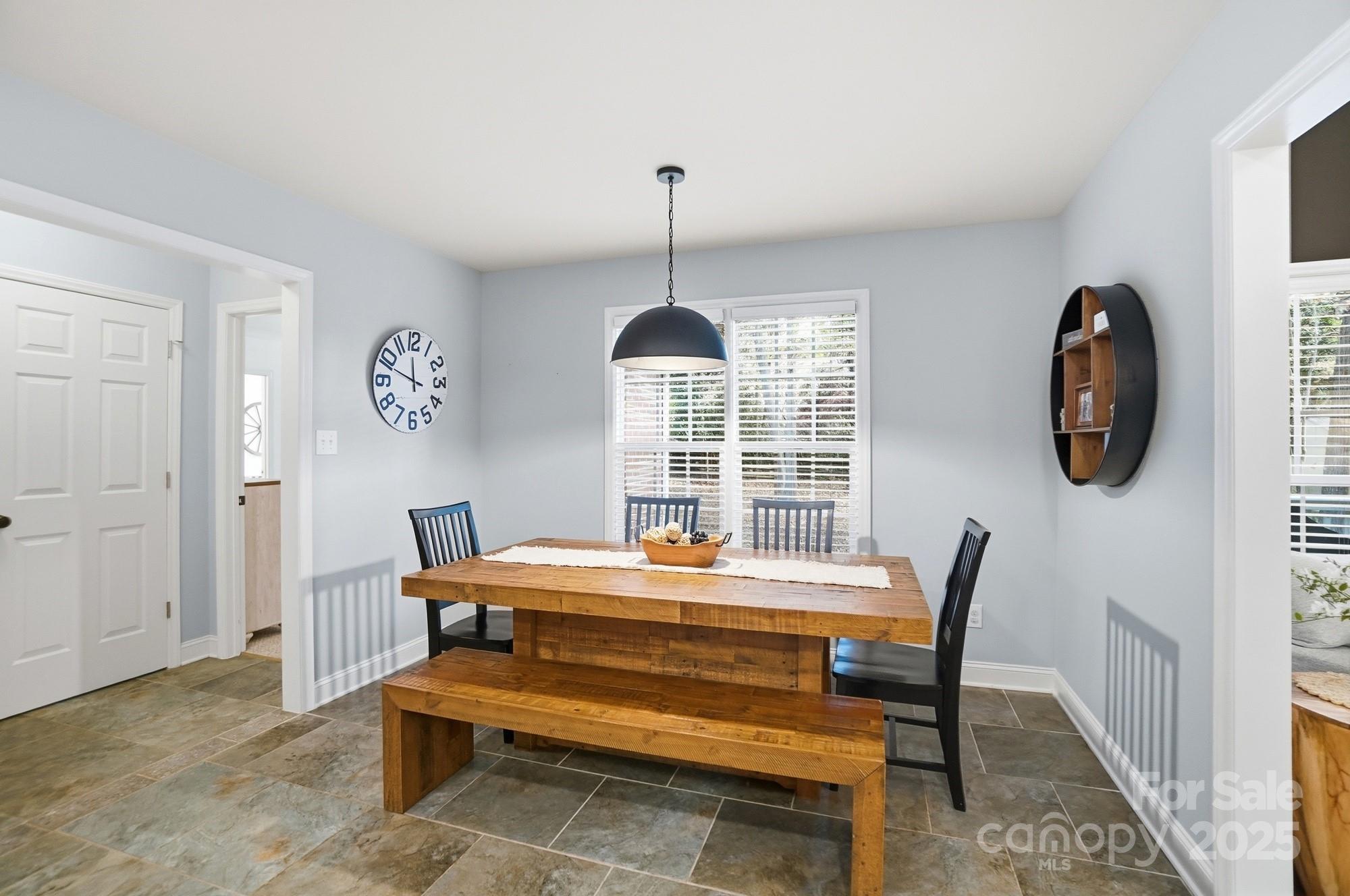 516 Jim Parker Road Monroe, NC 28110 - Photo 11 of 37 a dining room with furniture and window