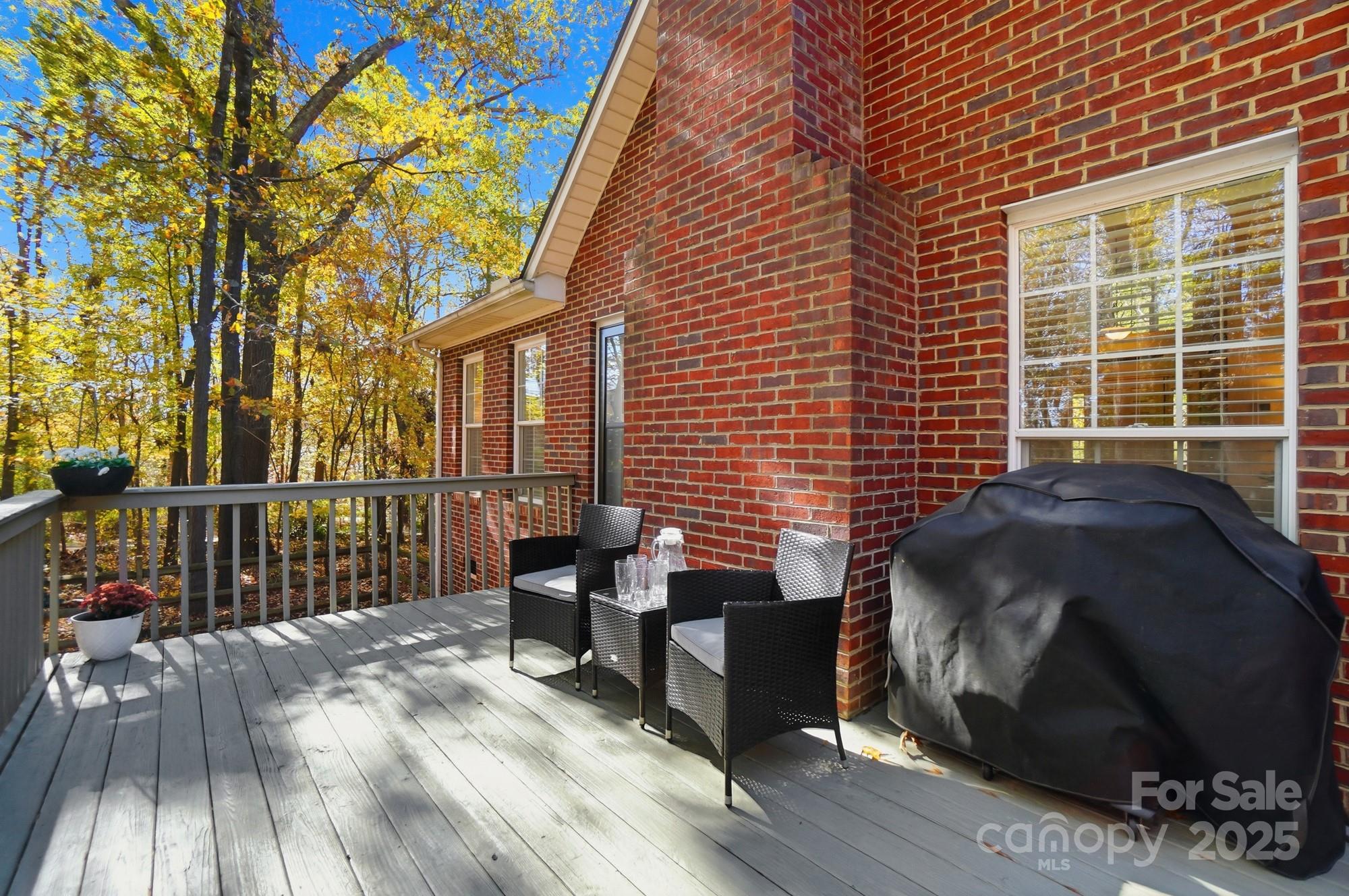 516 Jim Parker Road Monroe, NC 28110 - Photo 31 of 37 a view of a two chairs in the deck