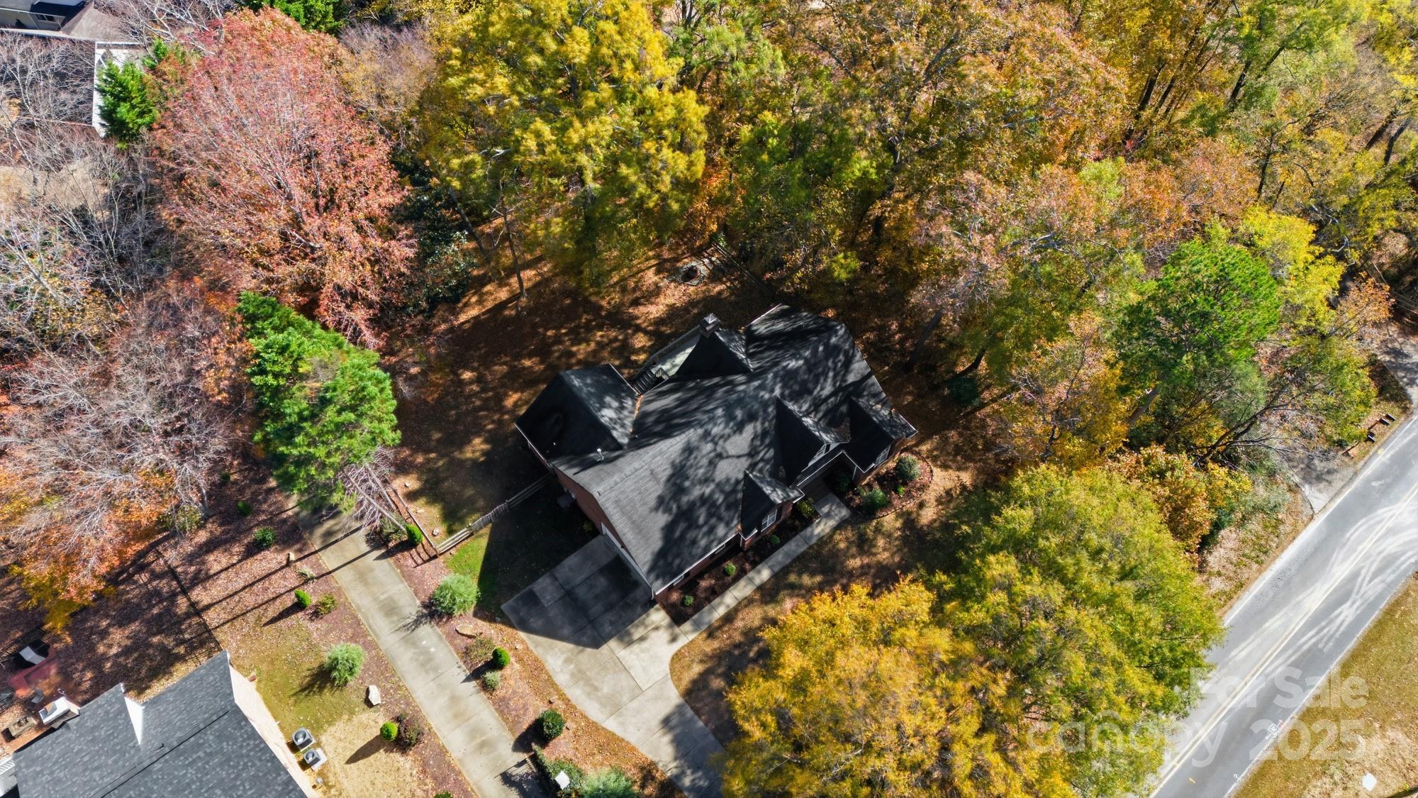 516 Jim Parker Road Monroe, NC 28110 - Photo 36 of 37 a backyard of a house with lots of green space