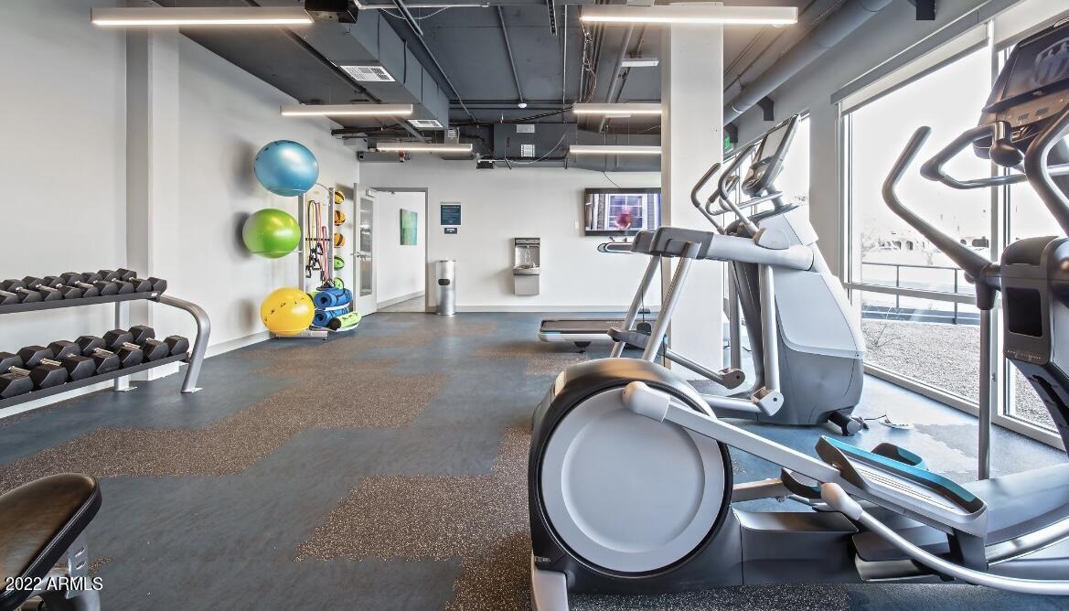 425 West Osborn Road, Unit 302 Phoenix, AZ 85013 - Photo 29 of 31 a view of a room with gym equipment