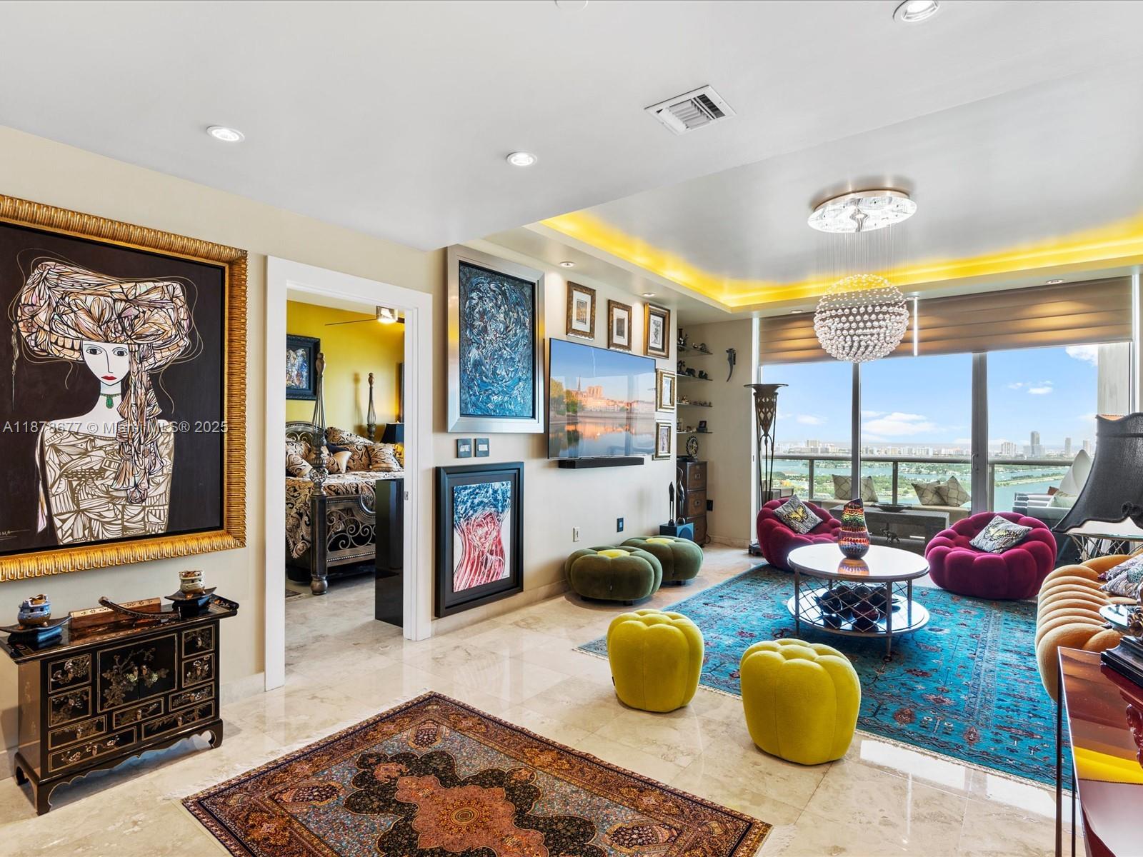 900 Biscayne Boulevard, Unit 3709 Miami, FL 33132 - Photo 17 of 57 a living room with furniture a rug and a large window