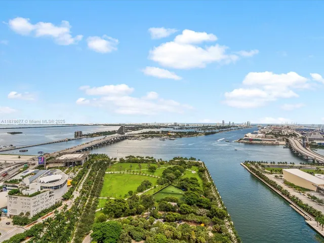 a view of a dining room with furniture and window
