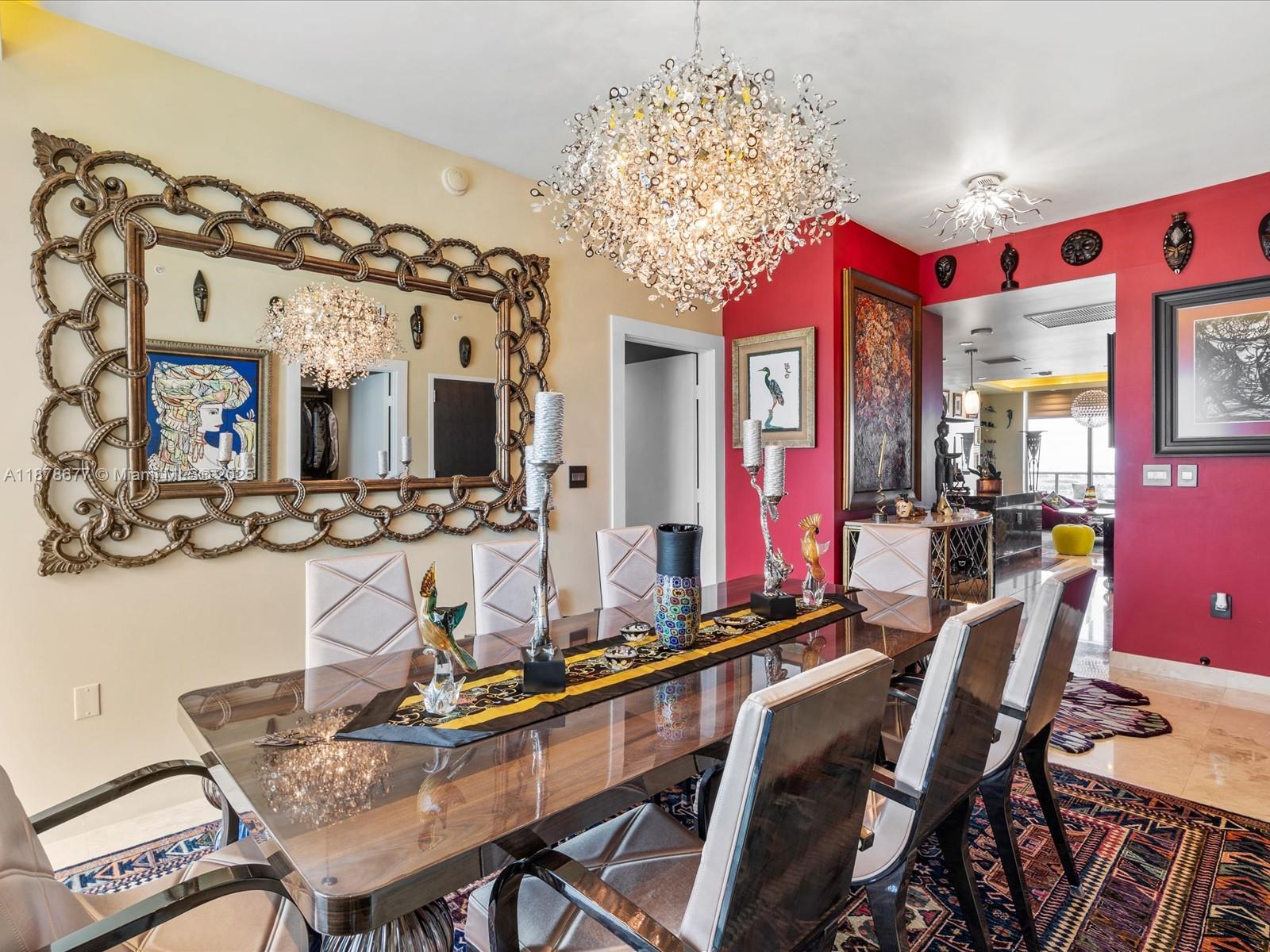 900 Biscayne Boulevard, Unit 3709 Miami, FL 33132 - Photo 26 of 57 a view of a dining room with furniture and chandelier