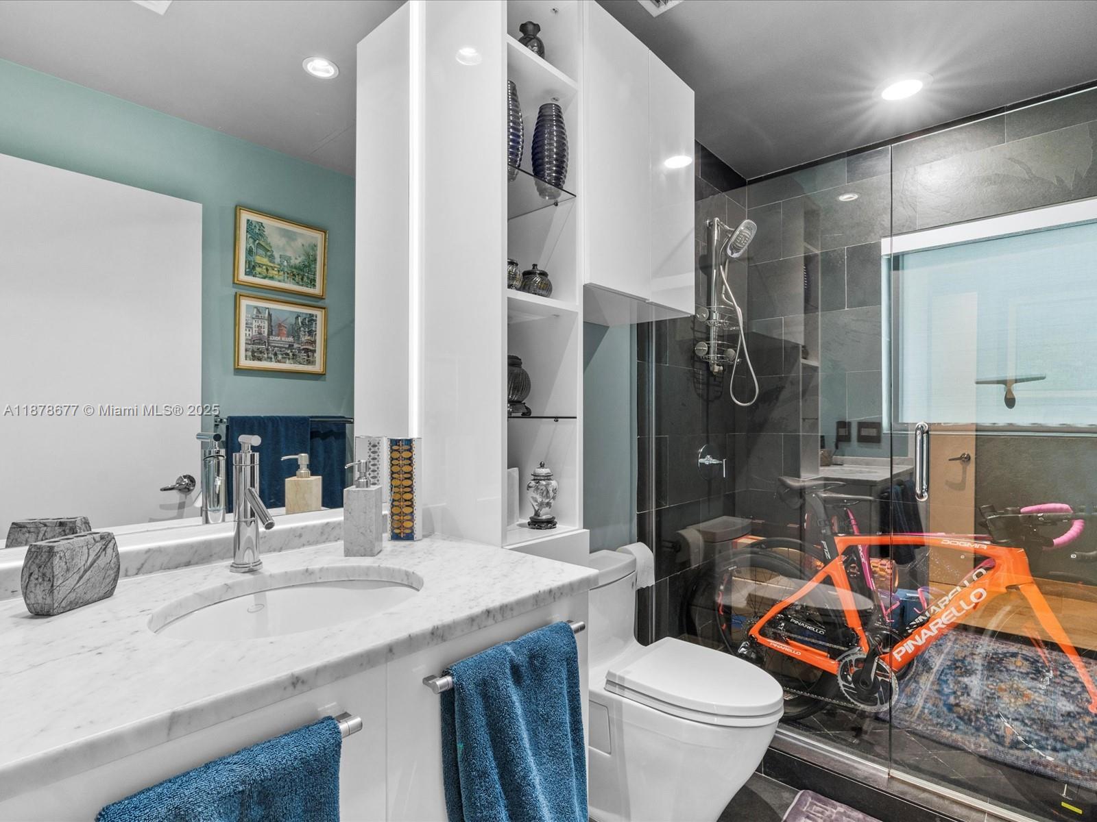 900 Biscayne Boulevard, Unit 3709 Miami, FL 33132 - Photo 36 of 57 a bathroom with a sink toilet and shower