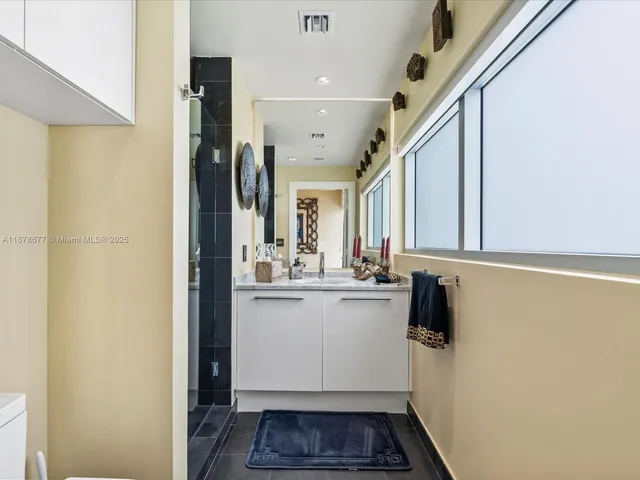 a view of a balcony with a potted plant