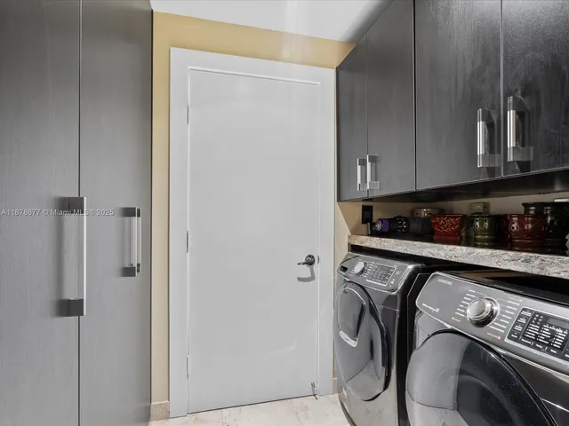 a balcony with furniture and a potted plant