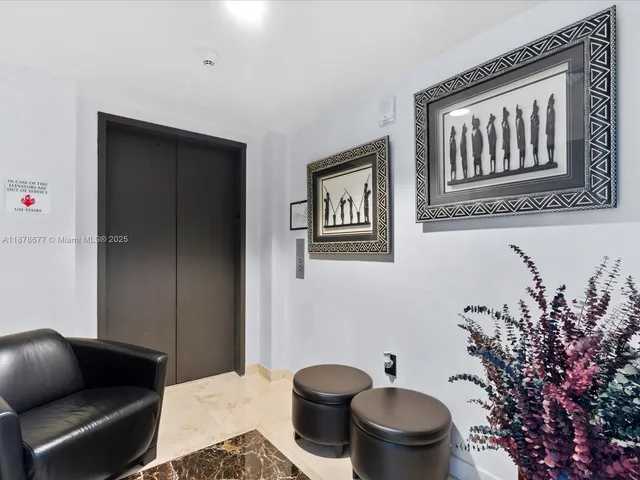 a swimming pool with outdoor seating and yard