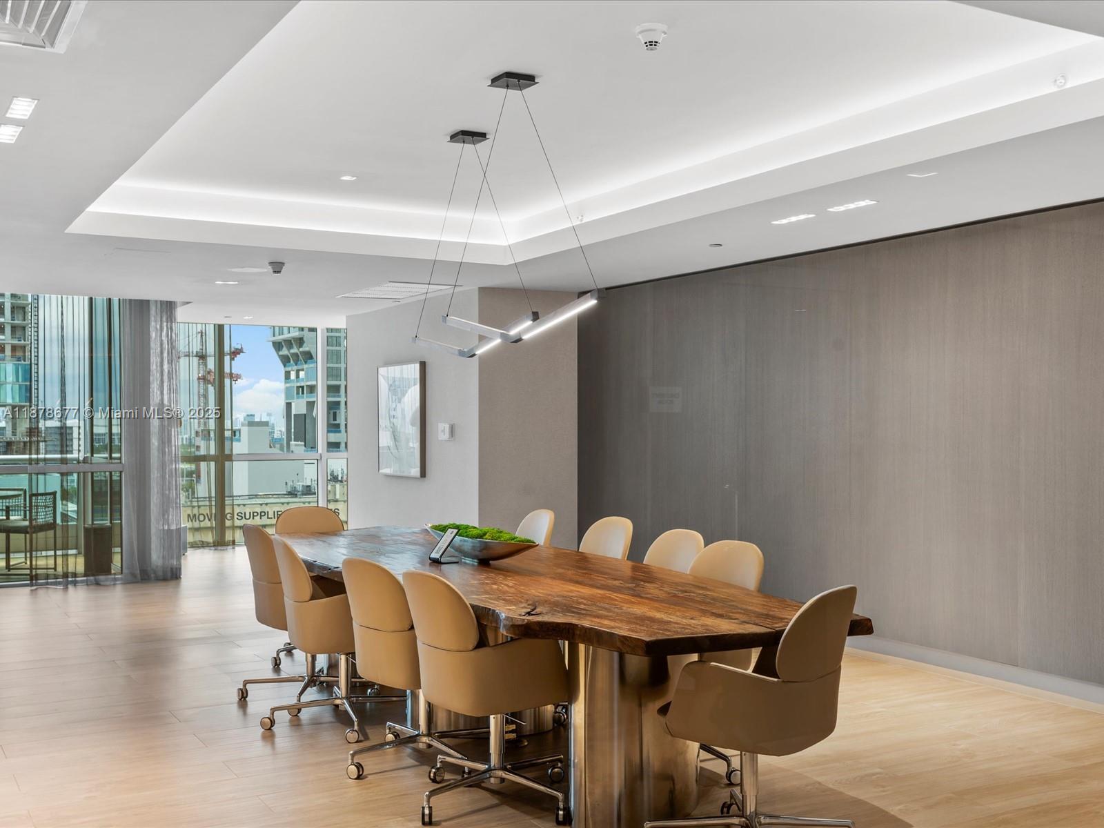 900 Biscayne Boulevard, Unit 3709 Miami, FL 33132 - Photo 51 of 57 a view of a dining room with furniture and wooden floor