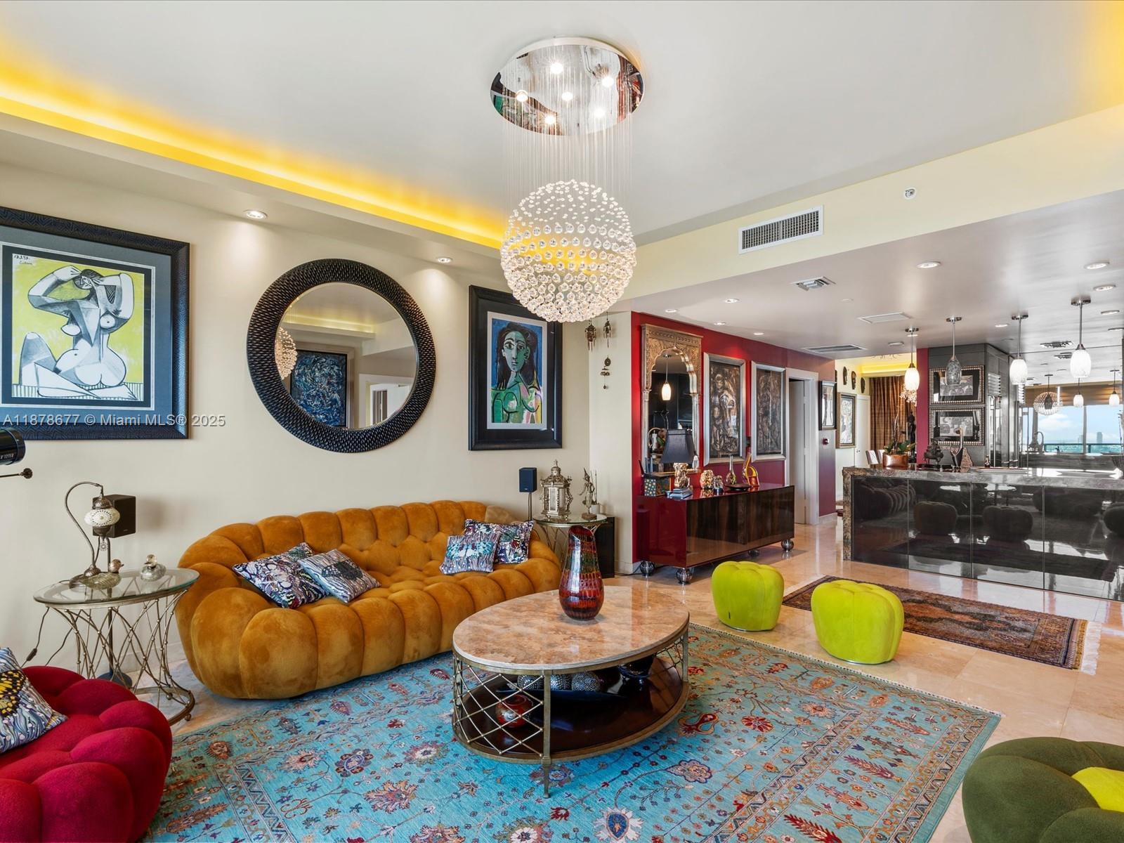 900 Biscayne Boulevard, Unit 3709 Miami, FL 33132 - Photo 9 of 57 a living room with furniture a rug and a chandelier