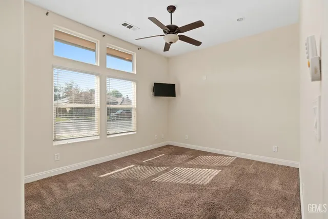 a view of a livingroom with white walls