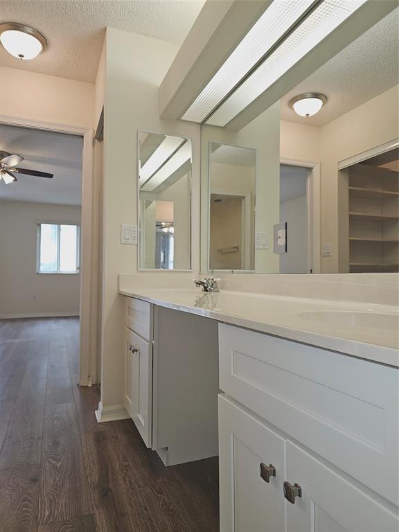 7843 Granville Drive, Unit 7843 Tamarac, FL 33321 - Photo 12 of 26 a bathroom with a double vanity sink and a mirror