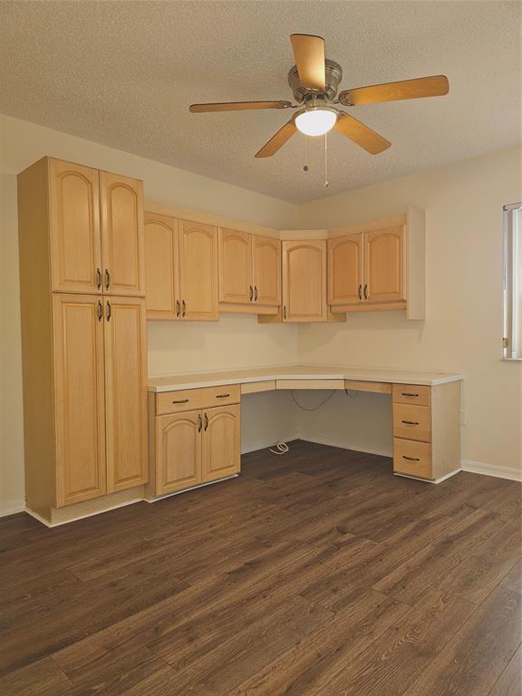7843 Granville Drive, Unit 7843 Tamarac, FL 33321 - Photo 16 of 26 a view of a kitchen with wooden floor