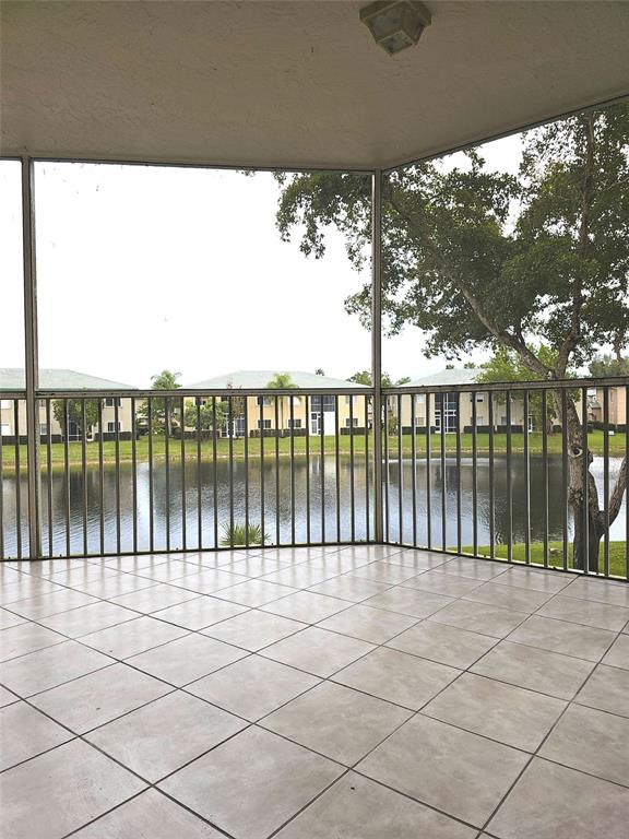 7843 Granville Drive, Unit 7843 Tamarac, FL 33321 - Photo 18 of 26 a view of lake from balcony