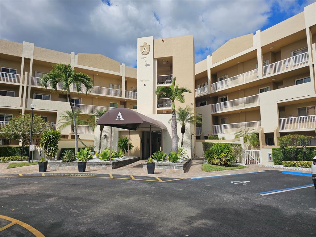 7843 Granville Drive, Unit 7843 Tamarac, FL 33321 - Photo 22 of 26 a view of building with street view