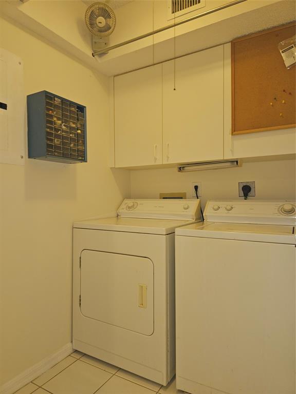 7843 Granville Drive, Unit 7843 Tamarac, FL 33321 - Photo 23 of 26 a utility room with dryer and washer